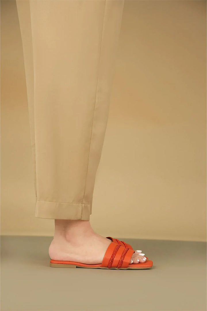 OPIA 5001 ORANGE semi-formal orange flats with diamontees and matte sole worn with beige pants