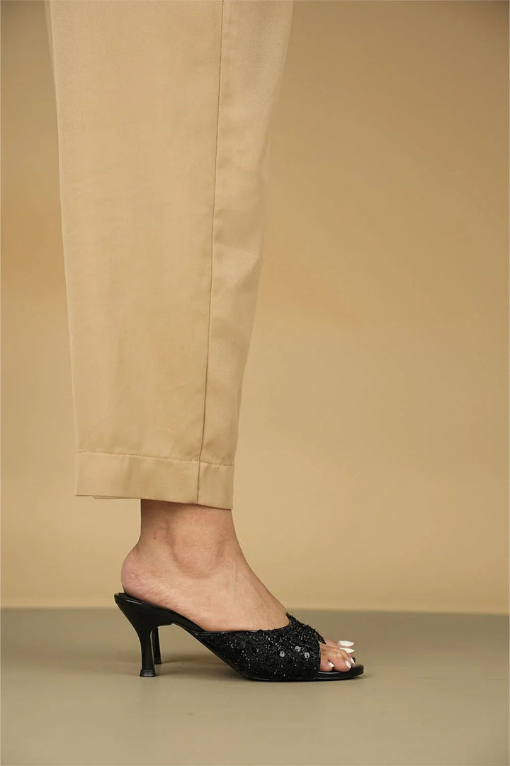 OPIA 9792 BLACK sequined black slip-on heels with mid-height heel, worn with beige pants